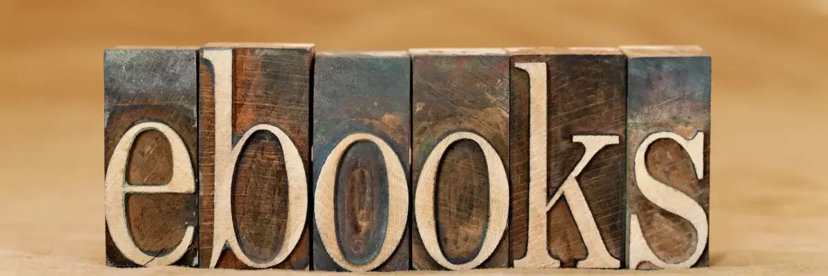 E-books et packs pour maman entrepreneure, pièces de bois assemblées formant le mot ebooks. Ebooks et packs pour maman entrepreneure, pièces de bois assemblées formant le mot ebooks.